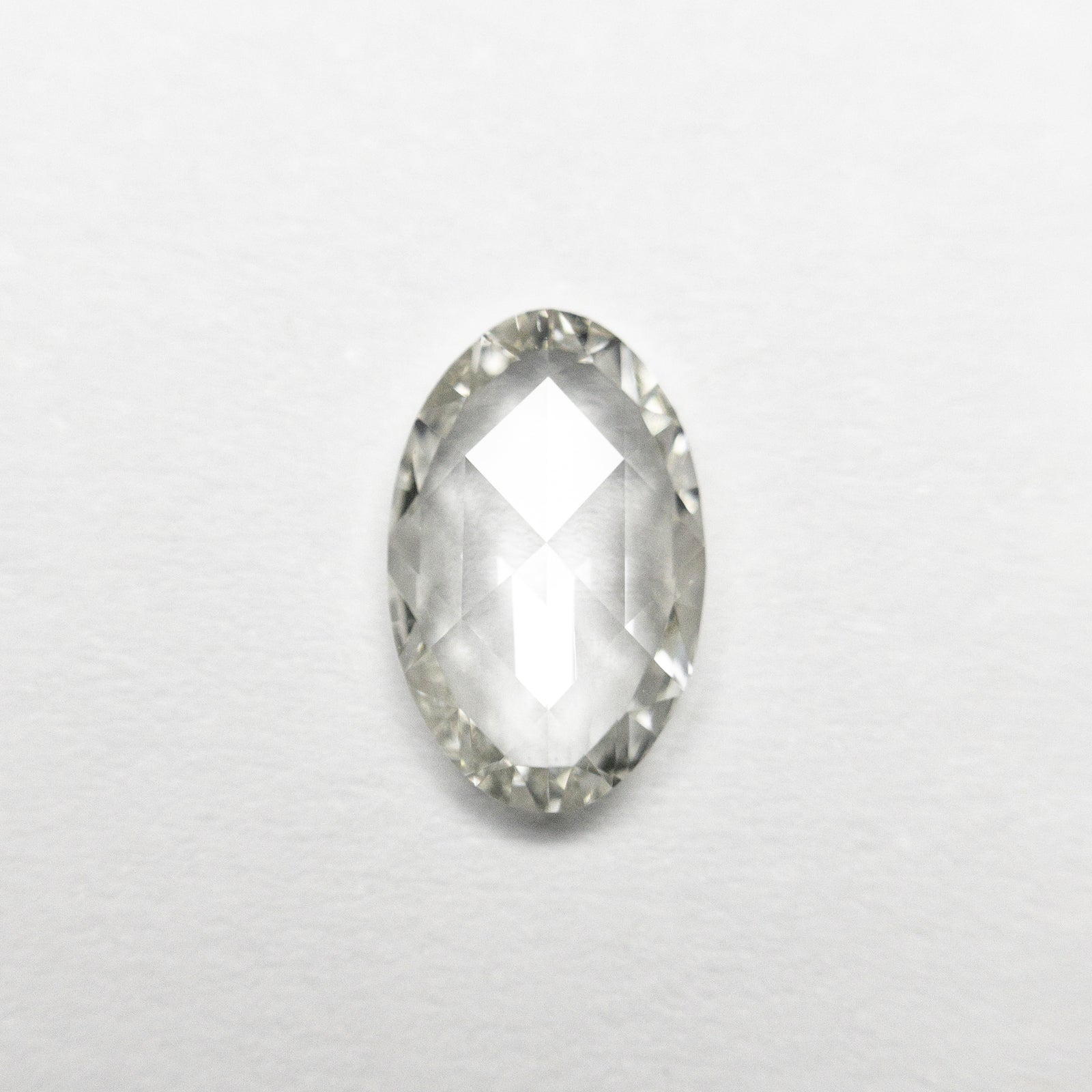 0.59ct 7.36x4.64x1.93mm VS2 K Oval Rosecut 21250-01