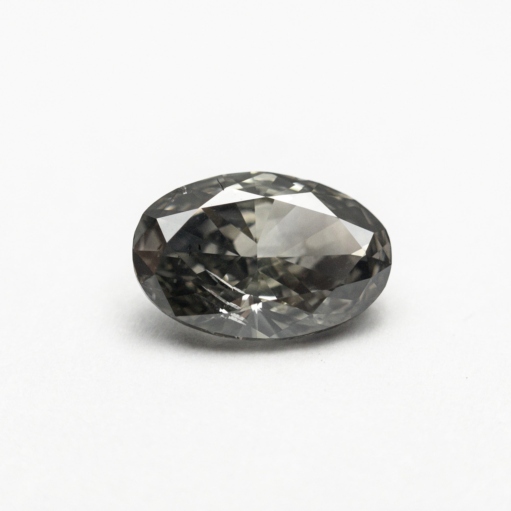 1.07ct 8.12x5.36x3.18mm SI2 Fancy Dark Grey Oval Brilliant 21593-09