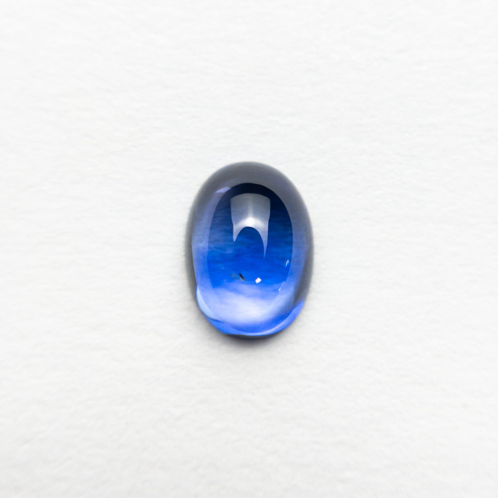 0.91ct 6.49x4.67x2.79mm Oval Cabochon Cut Sapphire 22178-01