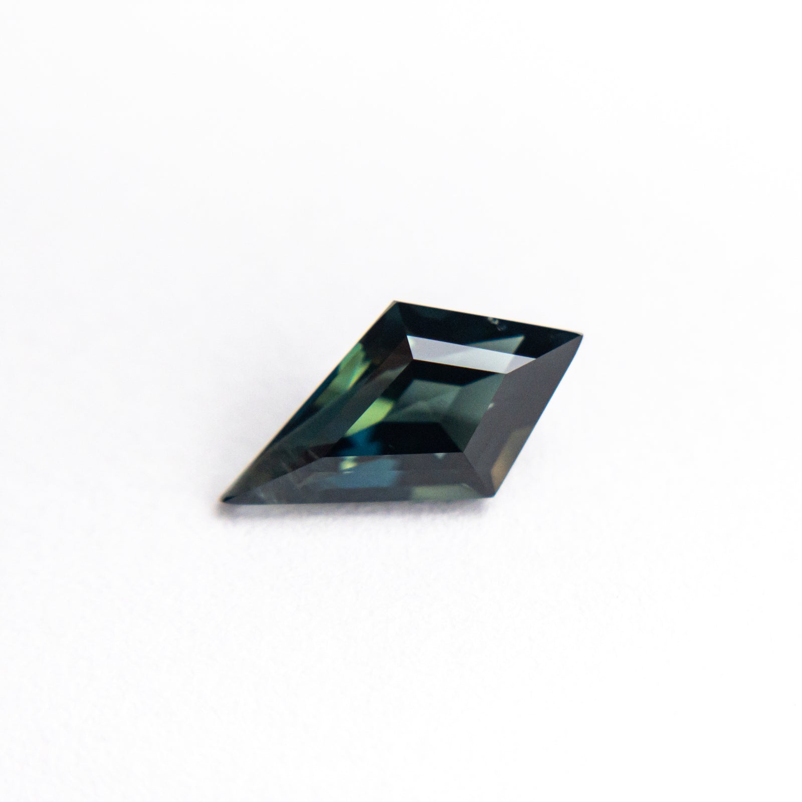 0.89ct 9.22x5.08x3.45mm Kite Step Cut Sapphire 22267-16