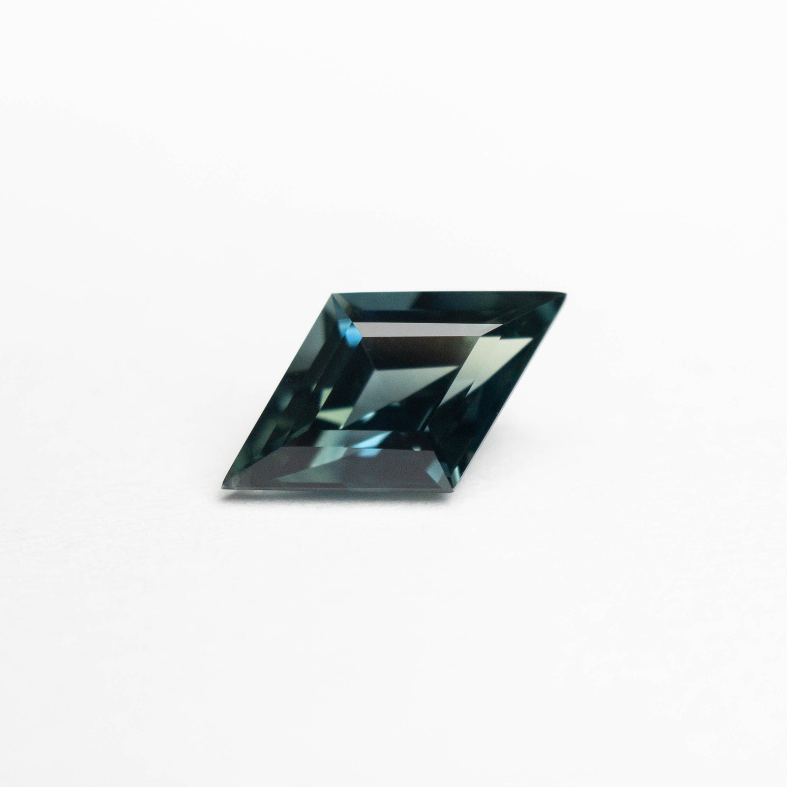 0.87ct 9.02x5.35x3.38mm Lozenge Step Cut Sapphire 22270-05