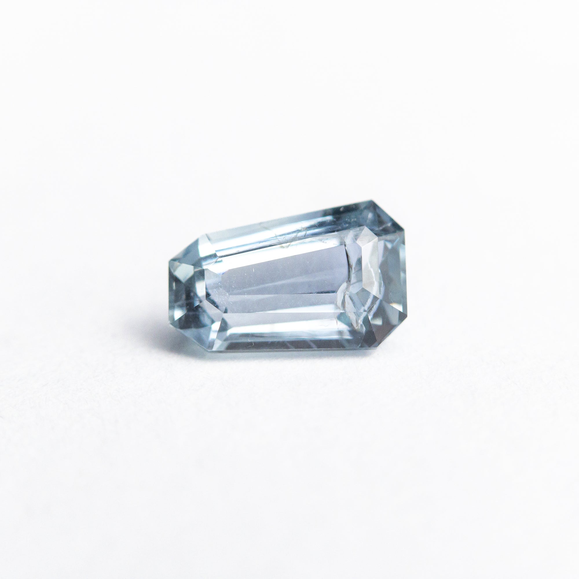 0.88ct 6.82x4.38x3.10mm Shield Step Cut Sapphire 22323-01