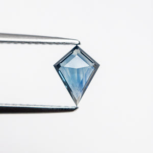 0.65ct 7.33x5.59x2.61mm Kite Step Cut Sapphire 22433-03