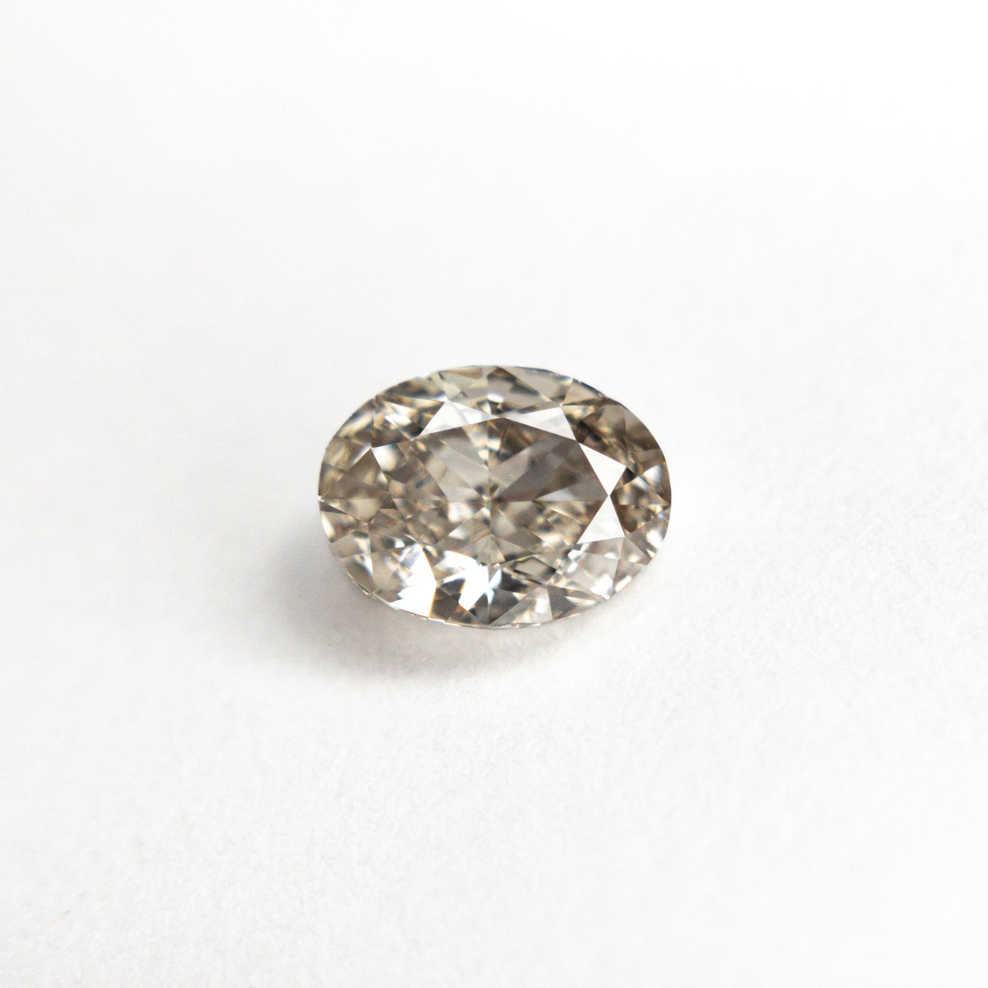 0.83ct 6.50x4.95x3.14mm VS1 C3 Oval Brilliant 22753-07