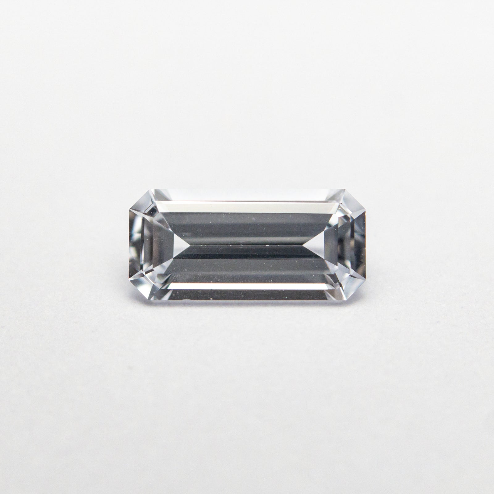 0.65ct 7.47x3.51x2.35mm Cut Corner Rectangle Step Cut Sapphire 22838-01