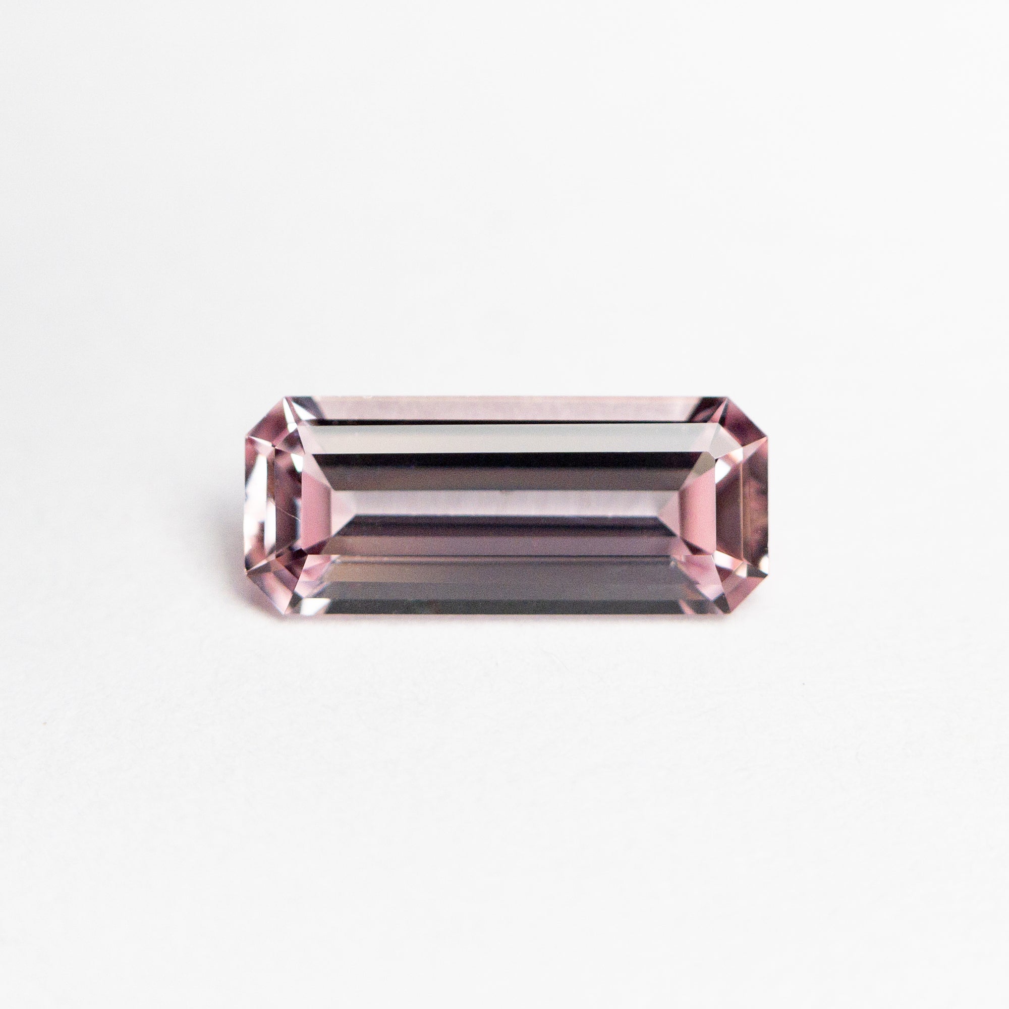 0.71ct 8.26x3.43x2.26mm Cut Corner Rectangle Step Cut Sapphire 22839-01