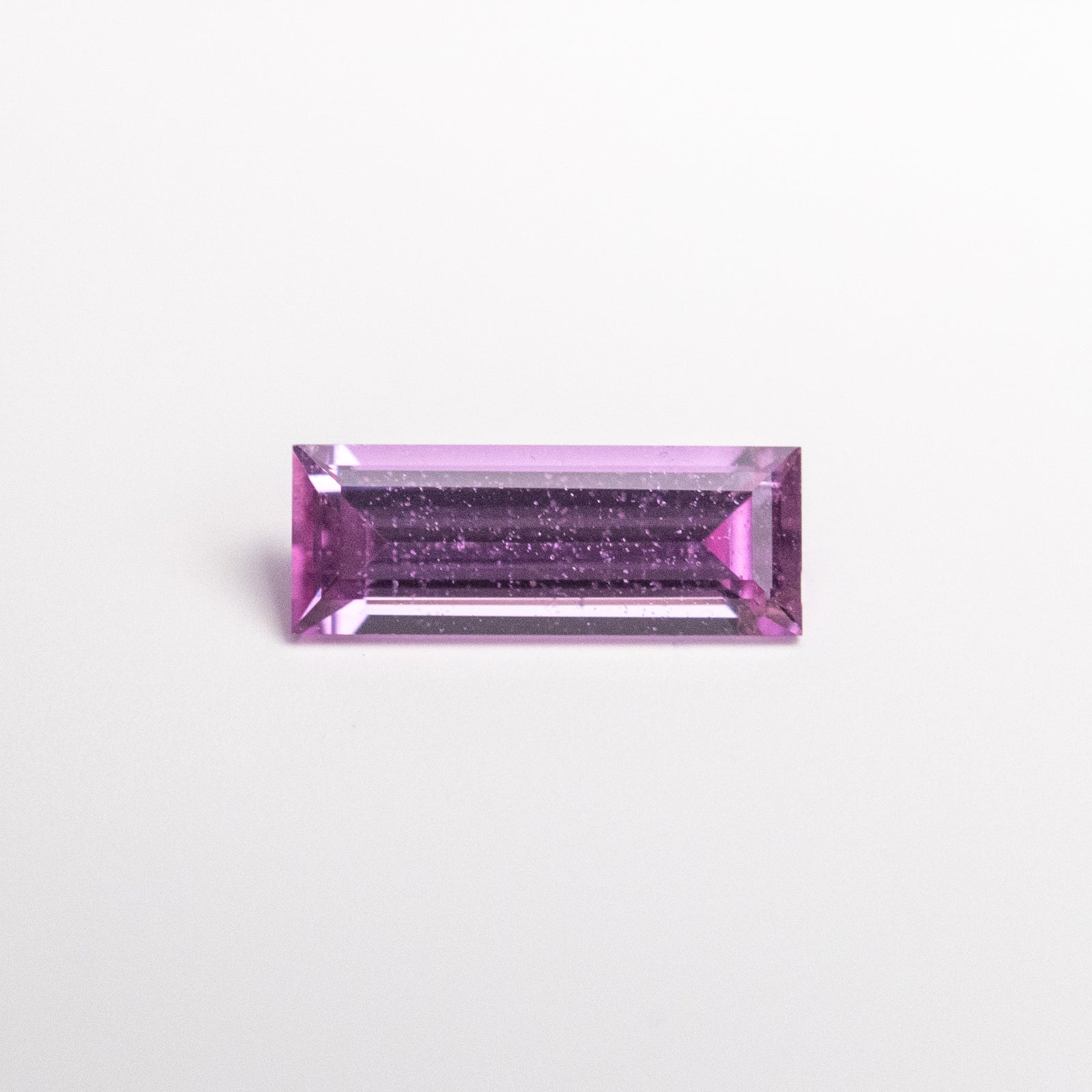 *SOLD to #16285* 0.37ct 6.98x2.59x1.85mm Baguette Step Cut Sapphire 22852-01