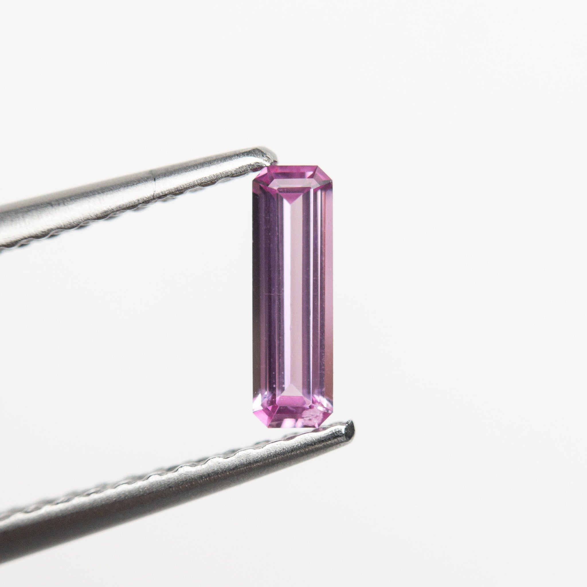 0.27ct 7.20x2.19x1.49mm Cut Corner Rectangle Step Cut Sapphire 22858-01