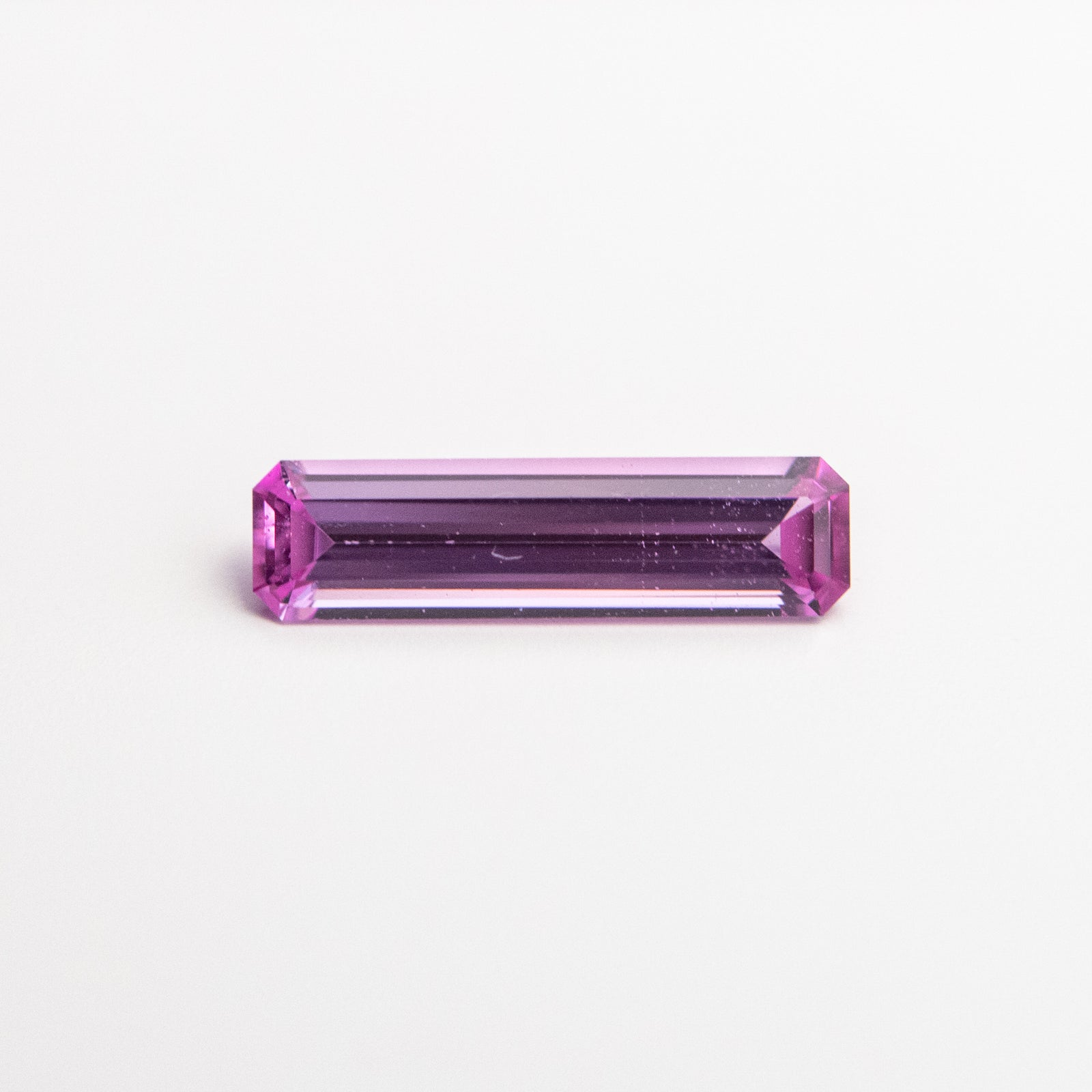 0.36ct 8.51x2.28x1.59mm Cut Corner Rectangle Step Cut Sapphire 22859-01