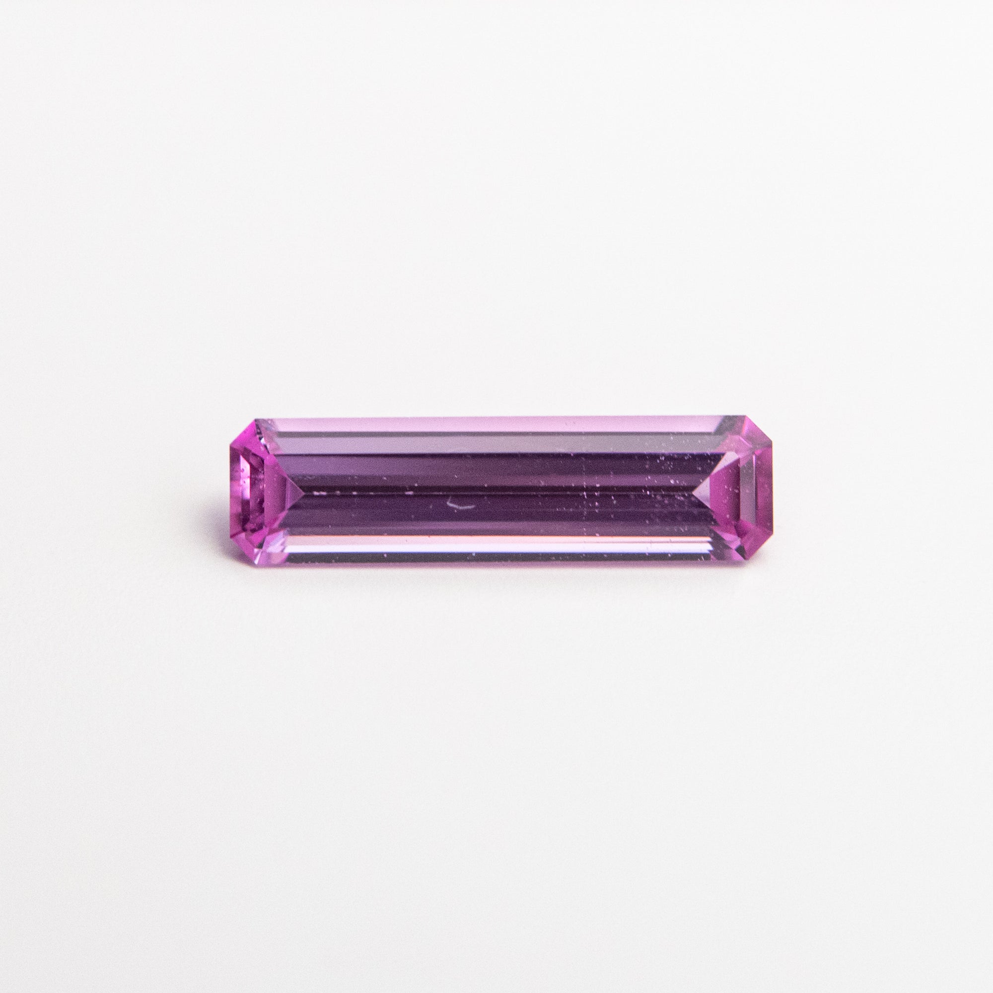 0.36ct 8.51x2.28x1.59mm Cut Corner Rectangle Step Cut Sapphire 22859-01