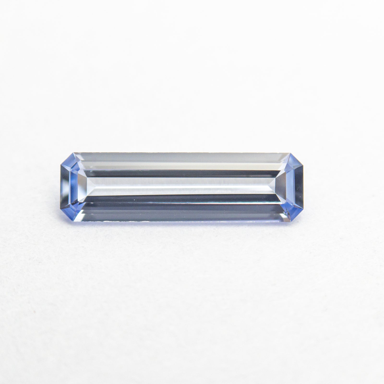 0.48ct 9.71x2.77x1.56mm Cut Corner Rectangle Step Cut Sapphire 22868-01