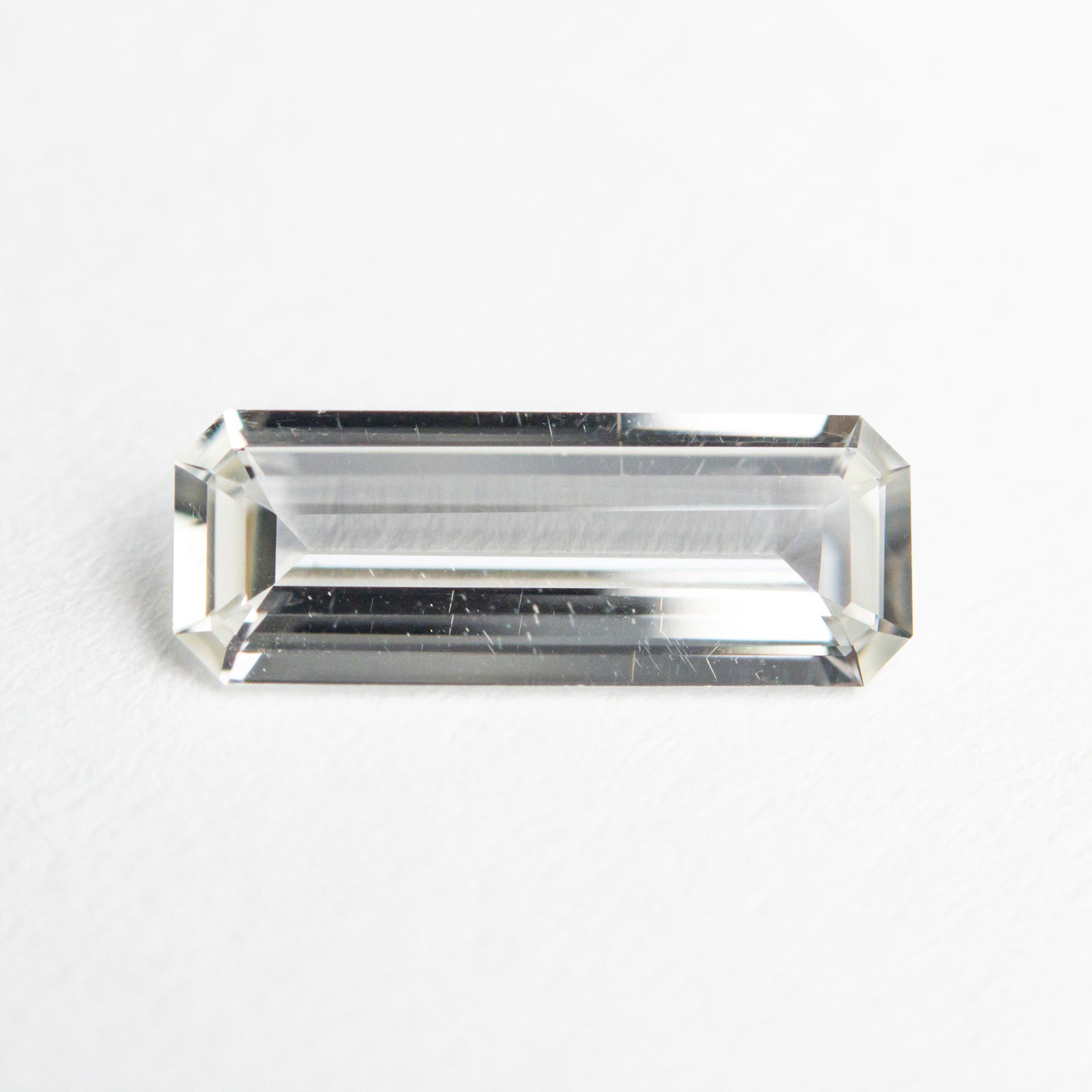0.84ct 10.01x3.69x2.02mm Cut Corner Rectangle Step Cut Sapphire 22871-01