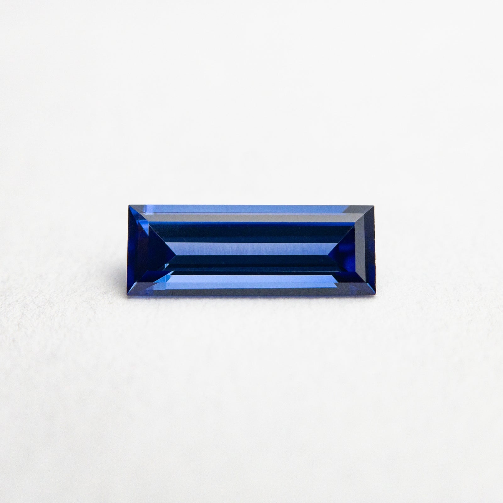 0.55ct 7.99x3.00x2.08mm Baguette Step Cut Sapphire 22876-01