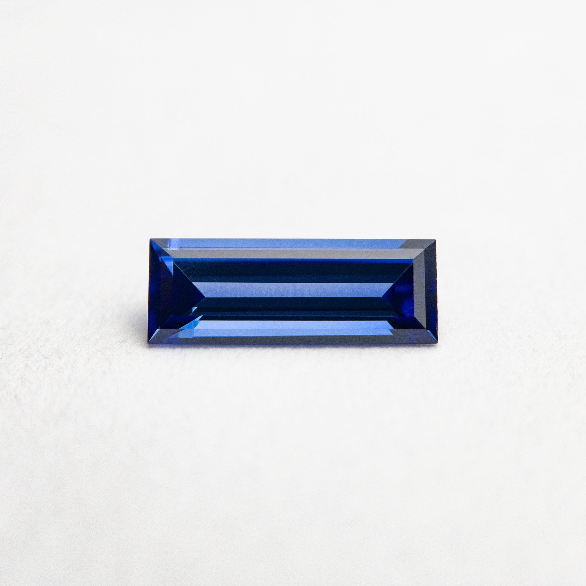 0.55ct 7.99x3.00x2.08mm Baguette Step Cut Sapphire 22876-01